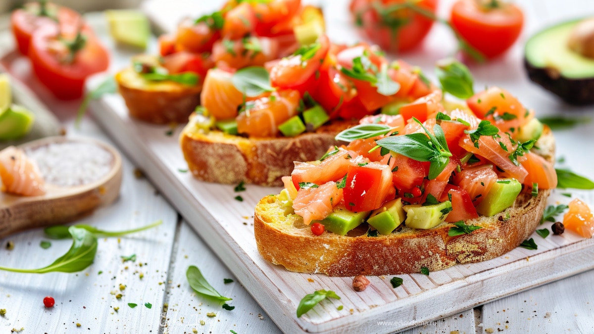 Брускетты с красной рыбой, авокадо и помидорами